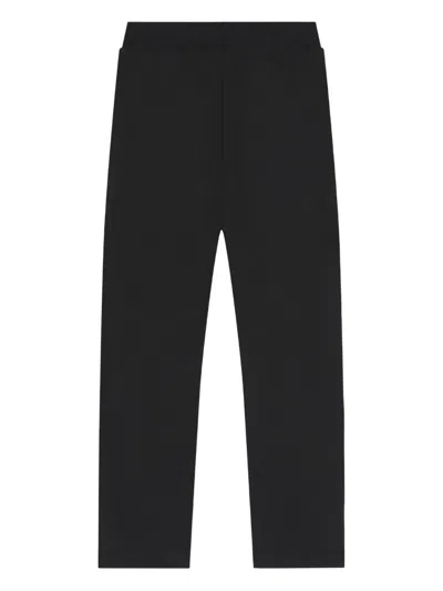 Guess Logo-embellished Track Pants In Black