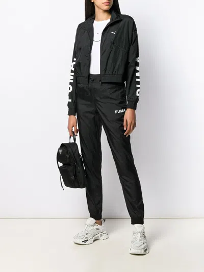 Puma Logo Printed Track Pants In Multi