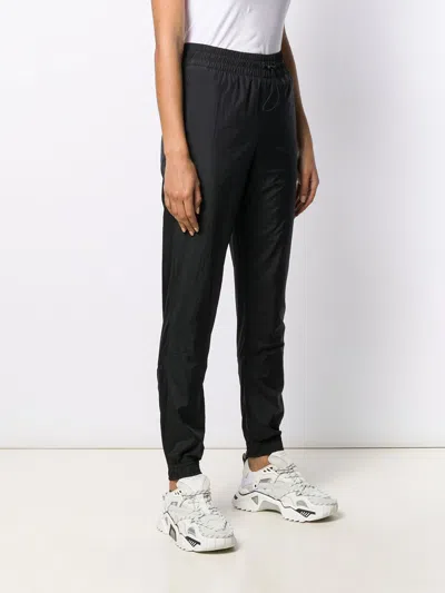 Puma Logo Printed Track Pants In Multi