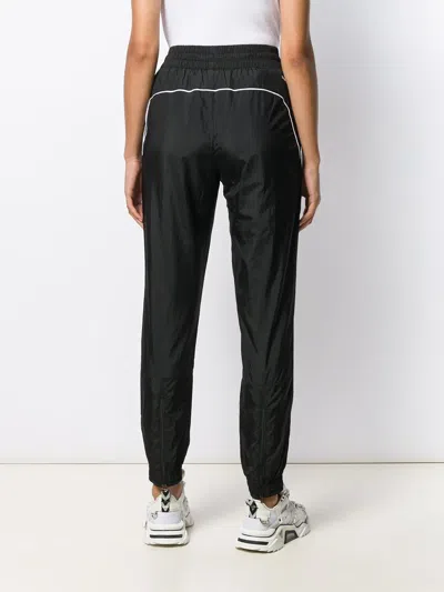 Puma Logo Printed Track Pants In Multi