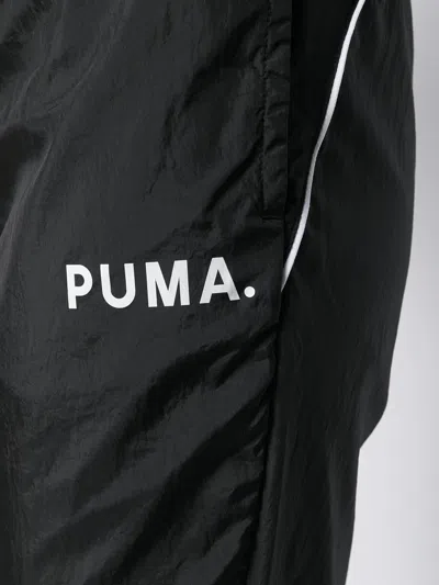 Puma Logo Printed Track Pants In Multi