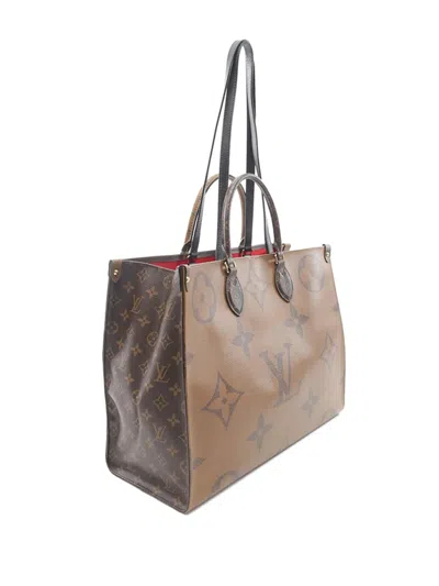 Pre-owned Louis Vuitton 2021 Monogram Reverse Giant Onthego Gm Satchel In Brown