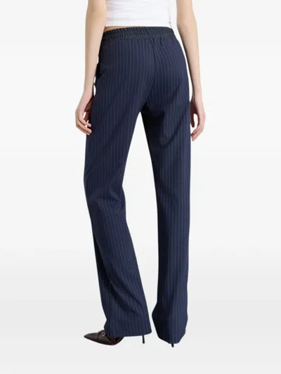 Gaëlle Pinstripe Drawstring Trousers In Blue