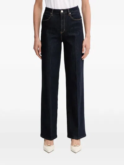 Guess Usa Logo-patch Jeans In Blue