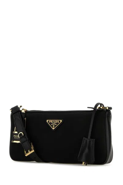Prada Small Re-nylon And Leather Shoulder Bag With Padlock In Black