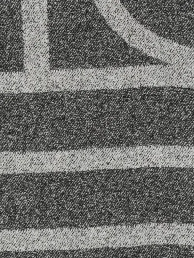 Totême Rectangular Wool Scarf Featuring Monogram Design In Multi