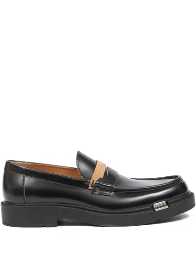 Maison Margiela Sophisticated Loafers For Men In Black