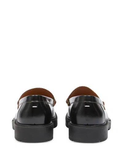 Maison Margiela Sophisticated Loafers For Men In Black
