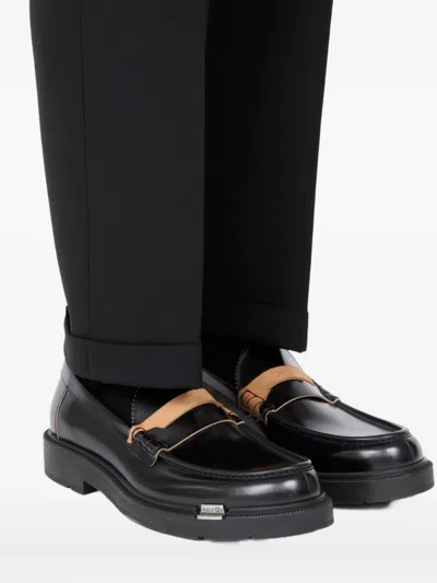 Maison Margiela Sophisticated Loafers For Men In Black