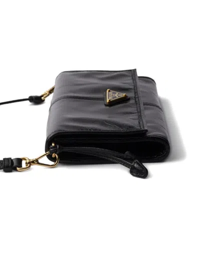 Prada Snap Triangle Leather Wallet In Black