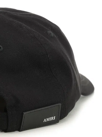 Amiri Logo Embroidered Curved Peak Hat In Black