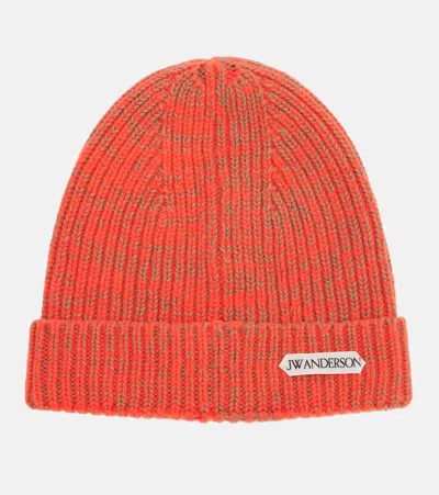 Jw Anderson Ribbed-knit Wool And Cotton Beanie In Red