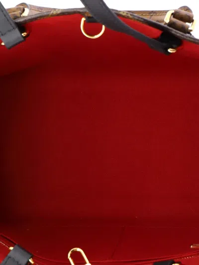 Pre-owned Louis Vuitton Onthego Reverse Monogram Giant Mm Tote Bag In Brown