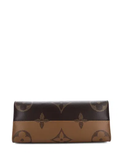 Pre-owned Louis Vuitton Onthego Reverse Monogram Giant Mm Tote Bag In Brown