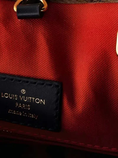 Pre-owned Louis Vuitton Onthego Reverse Monogram Giant Mm Tote Bag In Brown