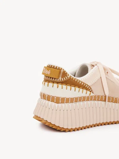 Chloé Low Top Sneakers Featuring Contrast Stitching And Textured Sole In Neutral