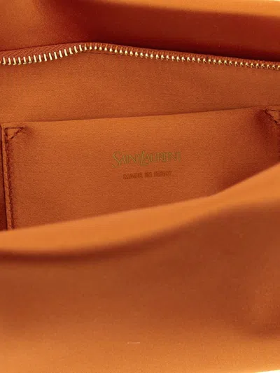 Saint Laurent Rectangular Clutch Featuring Chain Detail In Orange