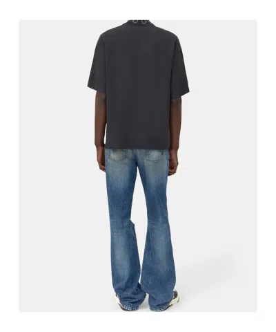 Amiri Slashed Boot Cut Jean In Blue