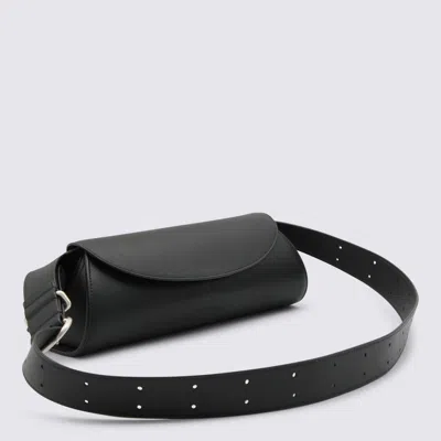 Jil Sander Cannolo Logo Embossed Small Shoulder Bag In Blue