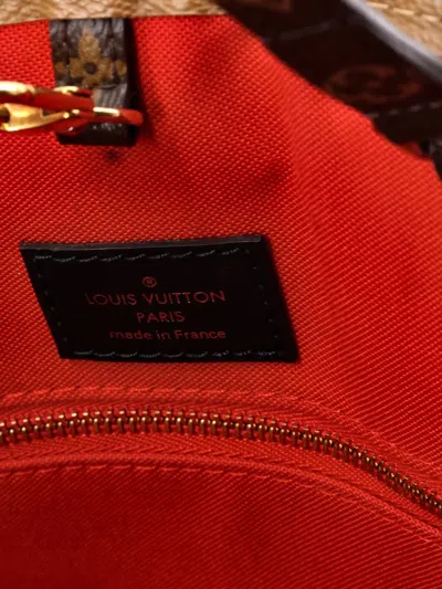 Pre-owned Louis Vuitton Onthego Reverse Monogram Giant Gm Tote Bag In Brown