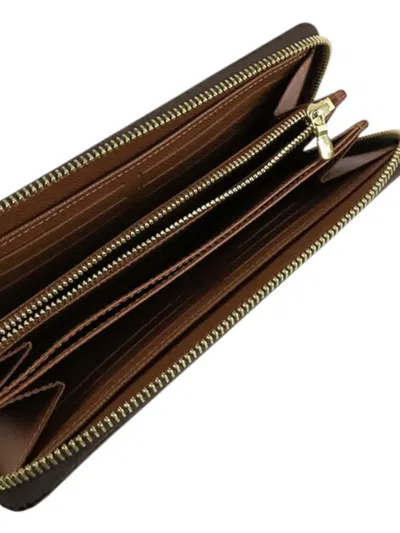 Pre-owned Louis Vuitton 2021-2025 Monogram Zippy Wallet Long Wallets In Brown