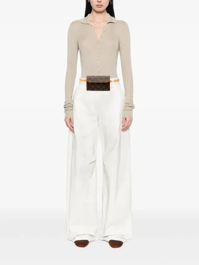 Pre-owned Louis Vuitton 2002 Monogram Pochette Florentine Belt Bag In Brown