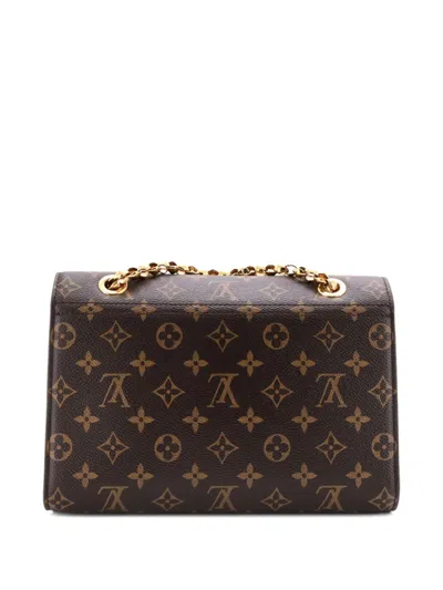 Pre-owned Louis Vuitton Victoire Handbag Monogram Canvas And Leather Shoulder Bag In Brown