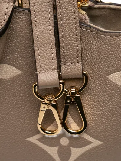 Pre-owned Louis Vuitton 2021-2025 Bicolor Monogram Empreinte Giant Petit Palais Satchel In Brown