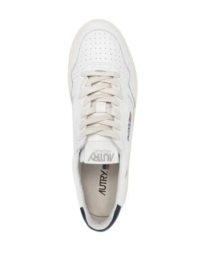 Autry Minimalist Low-top Sneakers With Perforated Detailing In Multi