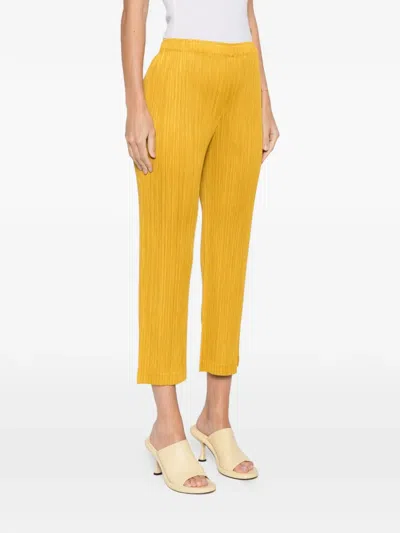 Issey Miyake Pleated Straight Trousers In Yellow