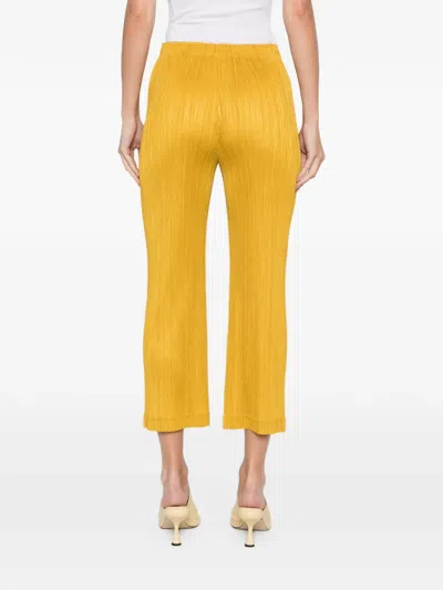 Issey Miyake Pleated Straight Trousers In Yellow