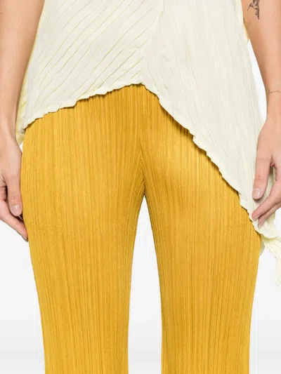 Issey Miyake Pleated Straight Trousers In Yellow