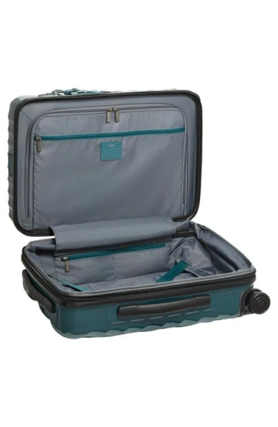 Tumi 22-inch 19 Degrees International Expandable Spinner Carry-on In Blue