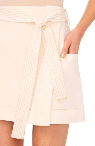 Cece Cargo Denim Wrap Skirt In White