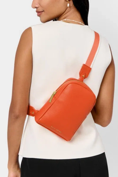 Katie Loxton Kaite Canvas Strap Sling Bag In Orange