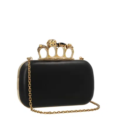 Alexander Mcqueen Skull Four Ring Embellished Clutch In Black