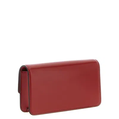 Valentino Garavani Vain Clutch Bag In Red