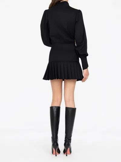 Les Filles D'eva Button Pleated Mini Dress In Black