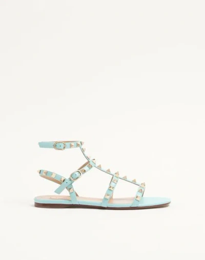 Valentino Garavani Rockstud Flat Calfskin Sandal With Straps Woman Aquamarine 39.5 In Blue