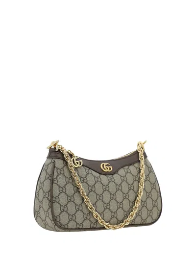 Gucci Women Beige Shoulder Bag With Gg Plaque On The Front And Chain-link Handle In Gg Canvas Woman In Brown