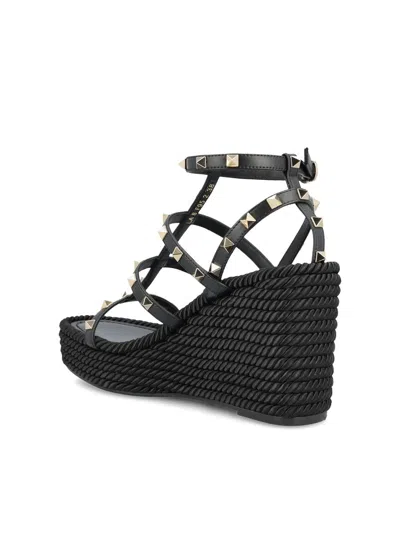 Valentino Garavani Rockstud Leather Wedge Sandals In Black