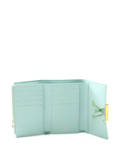 Pre-owned Louis Vuitton 2021s Capucines Leather Wallet In Green