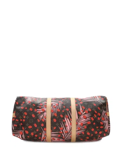 Pre-owned Louis Vuitton 2016 Monogram Jungle Dots Keepall Bandouliere 50 Travel Bag In Brown