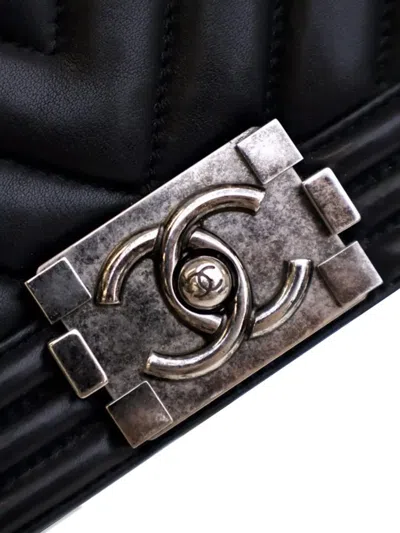 Pre-owned Chanel 2016-2017 Old Medium Chevron Lambskin Boy Flap Crossbody Bag In Black