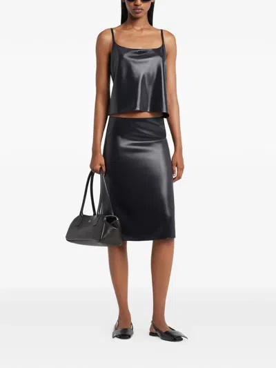 Courrèges Logo-embroidered Midi Skirt In Black