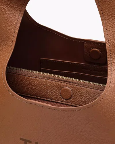 Marc Jacobs The Sack Embossed-logo Leather Shoulder Bag In Brown