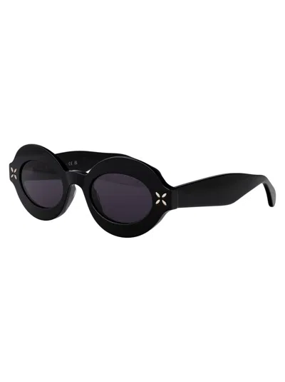 Alaïa Oval-frame Acetate Sunglasses In Black