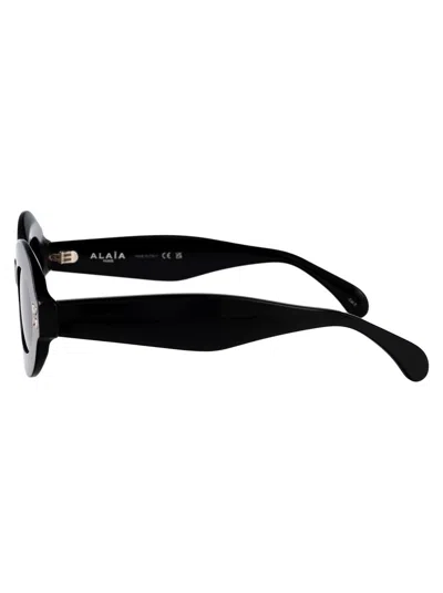 Alaïa Oval-frame Acetate Sunglasses In Black