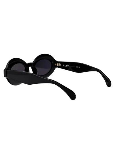 Alaïa Oval-frame Acetate Sunglasses In Black