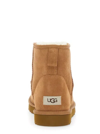 Ugg Classic Mini Brown Ankle Boots With Logo Patch On The Rear And Shearling Lining In Suede Man In Brown